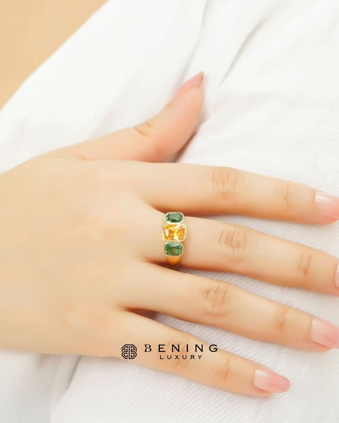 VALEN THREE STONE YELLOW SAPPHIRE AND TSAVORITE PAIR CUSHION RING